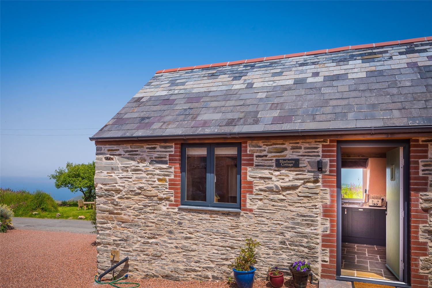 Blueberry cottage with a sea view, our new barn conversion cottages at Polrunny Farm